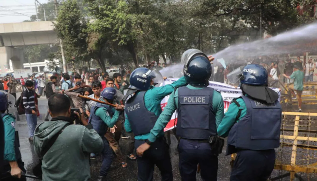 Police disperse protesters with water cannons sound grenades