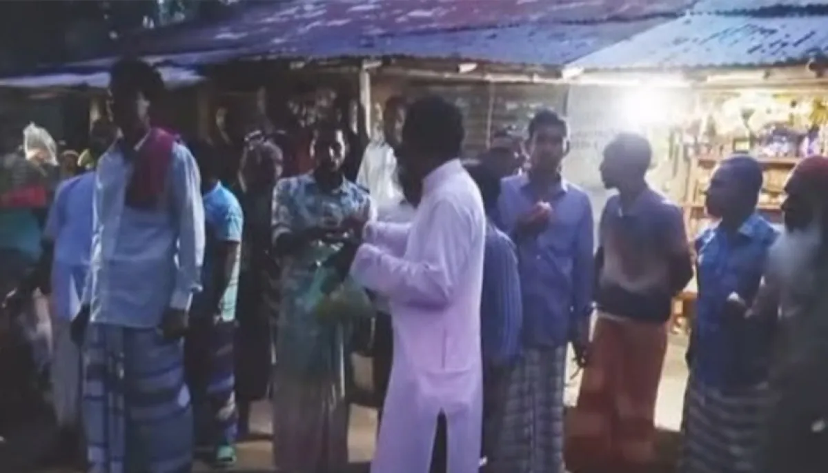 সেই ভাইরাল প্রধান শিক্ষক আটকের খবরে মিষ্টি বিতরণ