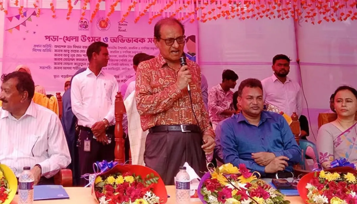 Primary and Mass Education Adviser Prof Dr Bidhan Ranjon Ray Poddar spoke at a view exchange meeting at the Natore Zila Parishad auditorium today. Photo : PID