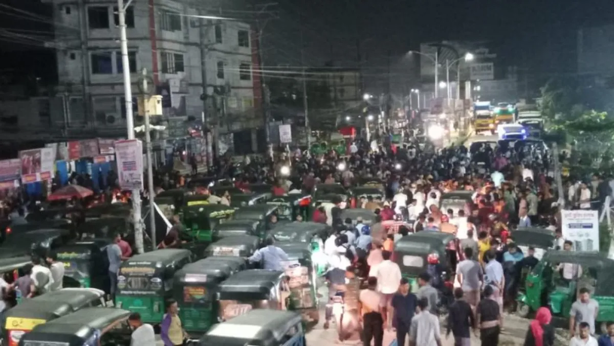 University students block road at midnight in protest
