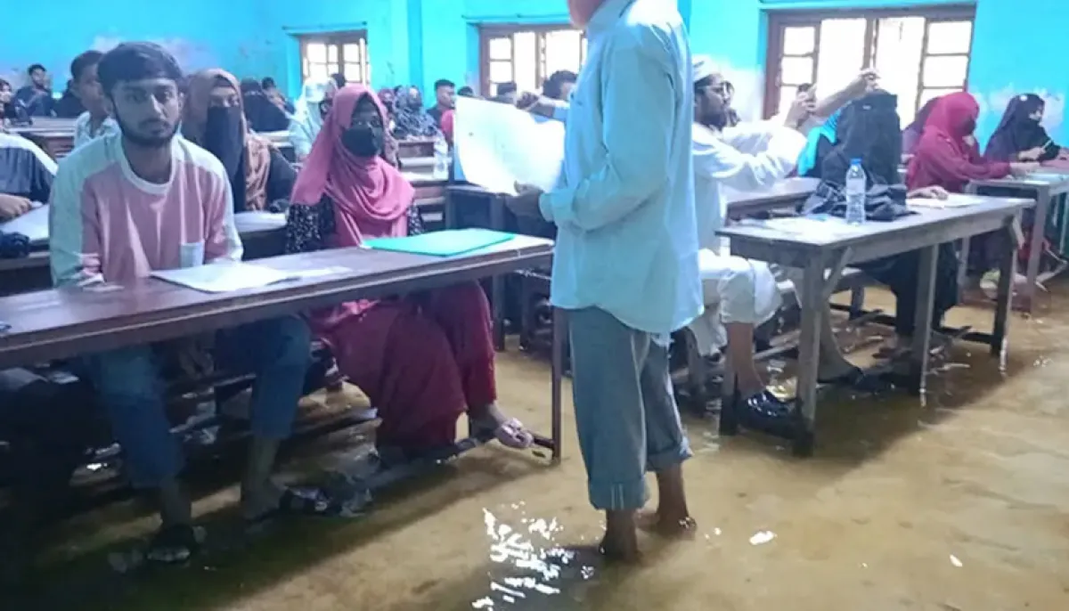 Students take national university entrance exam while sitting in water