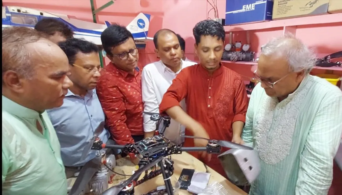 Tarique rahman stands beside drone maker ashir uddin in chittagong