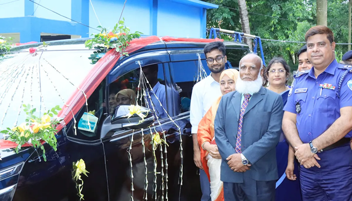 Royal farewell to the headmaster in a flower decked car