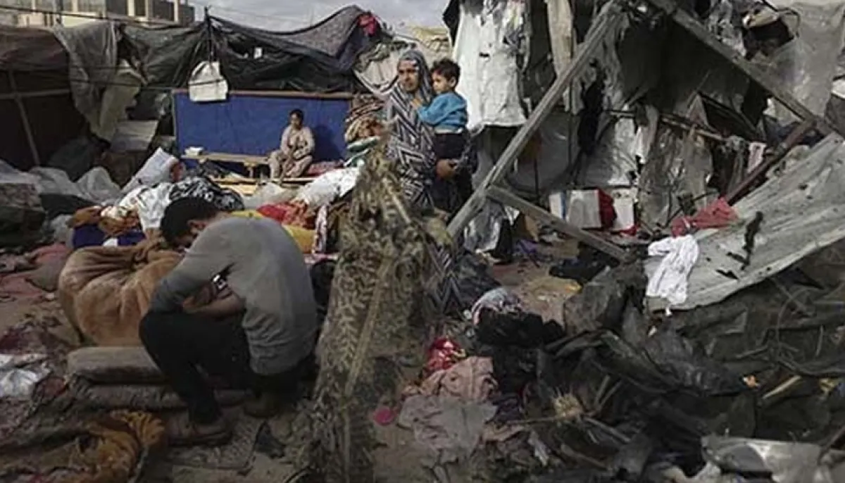 Spain pm alleges genocide in gaza as rescuers say 65 killed